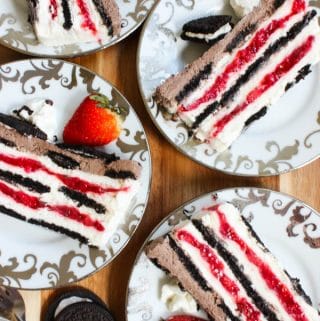 Oreo strawberry icebox cake layered with oreo cookies, strawberry filling and cream