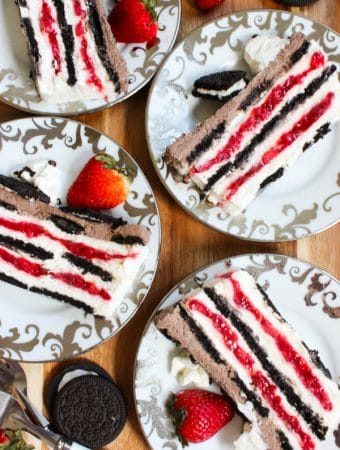Oreo strawberry icebox cake layered with oreo cookies, strawberry filling and cream