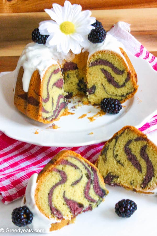 vanilla bundt cake with blackberry swirls