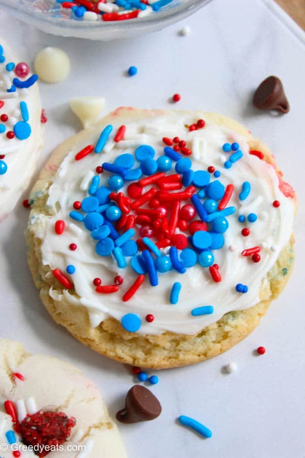 Frosted cookies with cake mix and confetti sprinkles