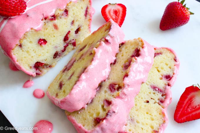 Easy strawberry bread with sour cream and oil topped with fruity strawberry glaze.