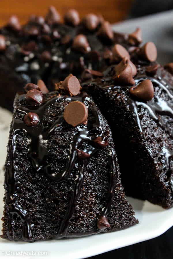 Easy Chocolate bundt cake recipe that is made with cake mix in a 10 inches bundt pan.