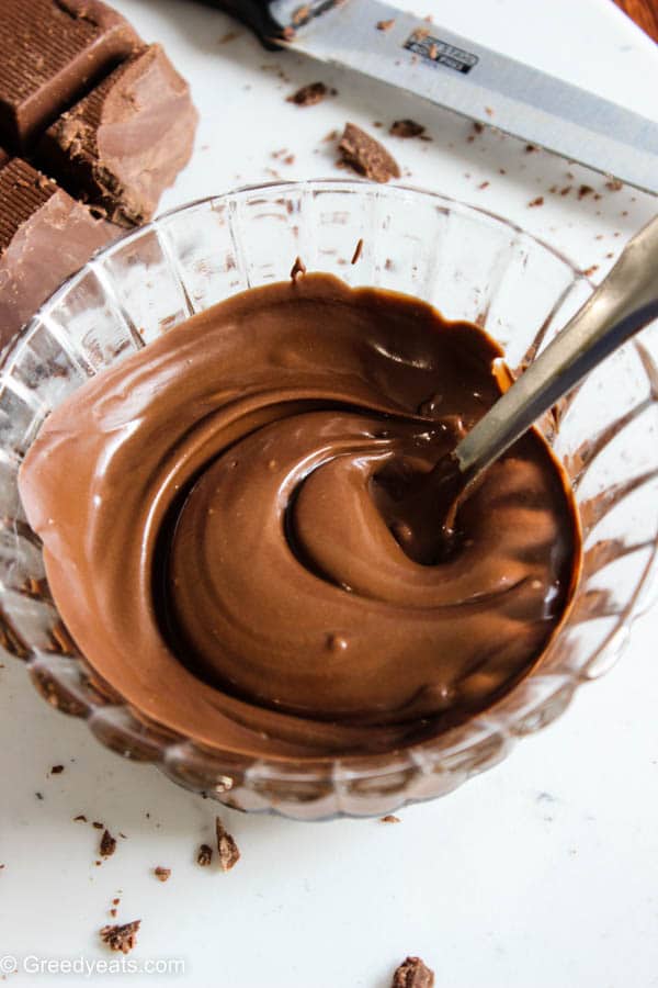 Melted chocolate for homemade strawberry cake pops