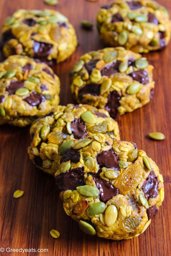 Thick and chewy oatmeal pumpkin cookies with chocolate chunks