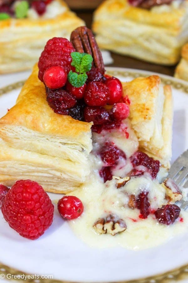 Cranberry brie puff pastry squares with candied pecans