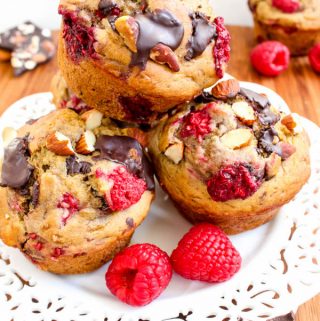 Healthy raspberry muffins with almond and chocolate chunks. Breakfast muffins never looked so delicious!