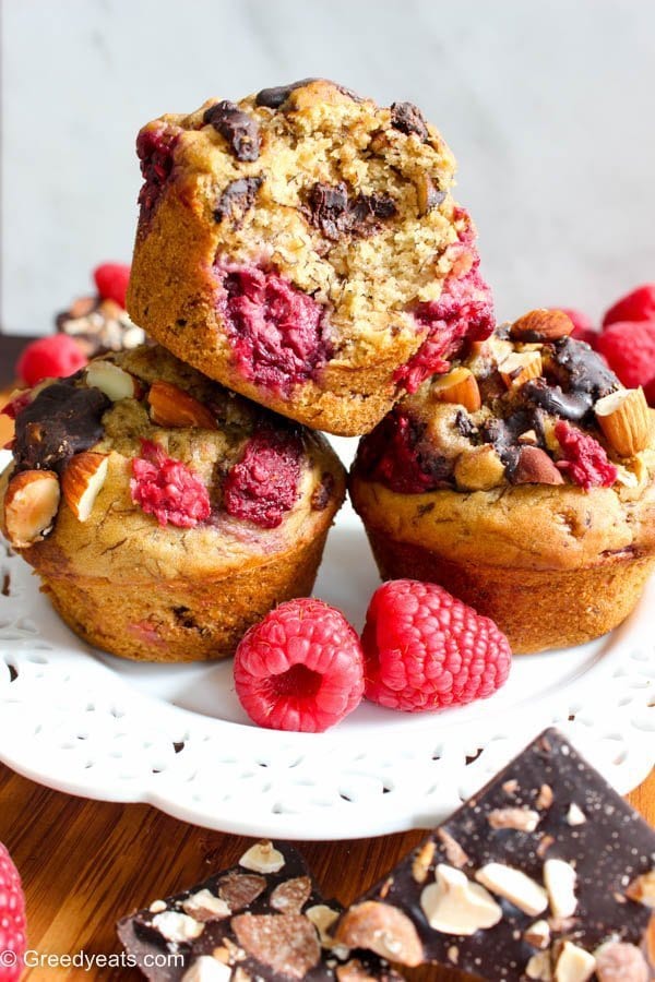 Easy and Healthy raspberry muffins studded with almonds and chocolate