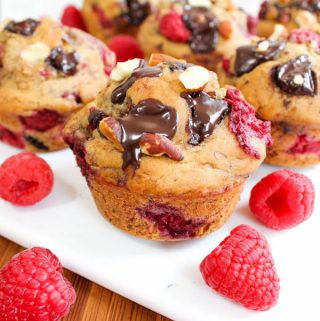 One bowl healthy raspberry muffins with almonds and chocolate made with banana puree