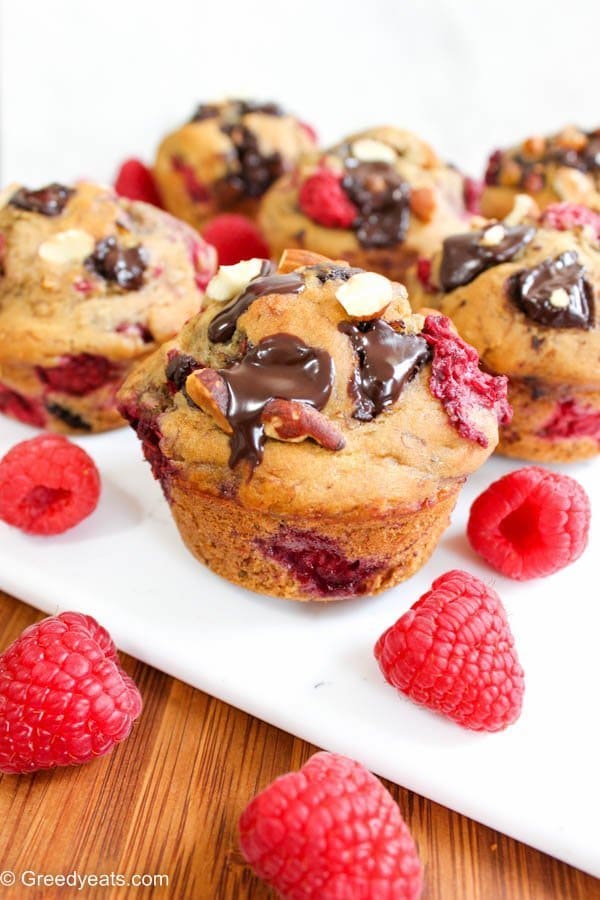 One bowl healthy raspberry muffins with almonds and chocolate made with banana puree
