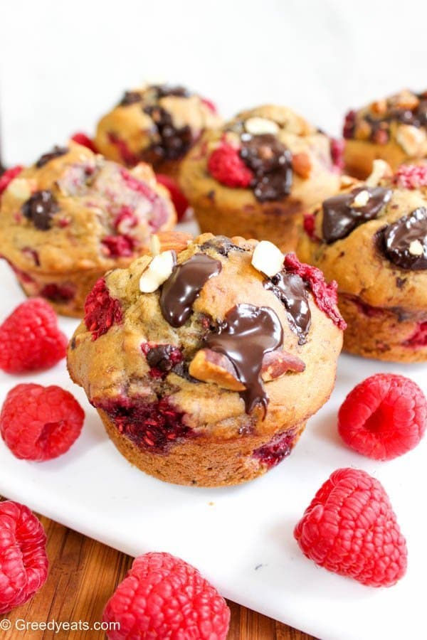 Healthy raspberry muffins with chocolate and almonds, moist and wholesome all the way!