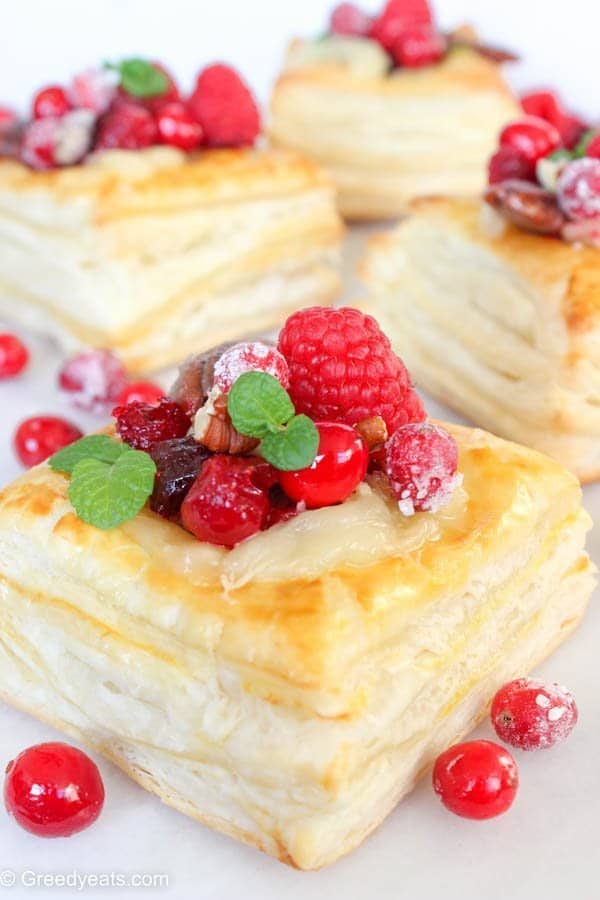 Cranberry brie pastry squares are flaky, buttery, rich and are oozing cheese all the way