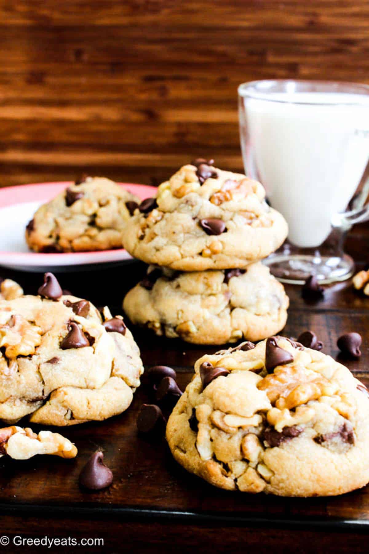 Soft in the centers and perfectly chewy on the edges chocolate chip cookies recipe dotted with walnuts and chocolate chips.