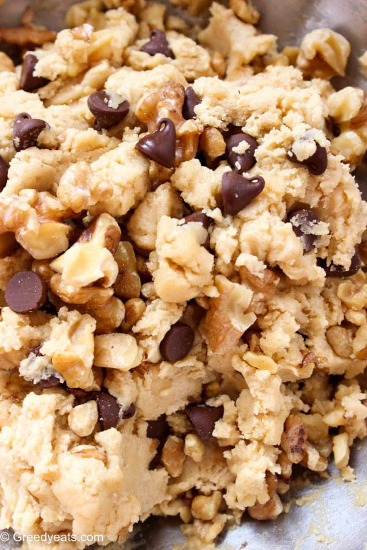 Cookie dough for thick, soft, fluffy and moist chocolate chip cookies.