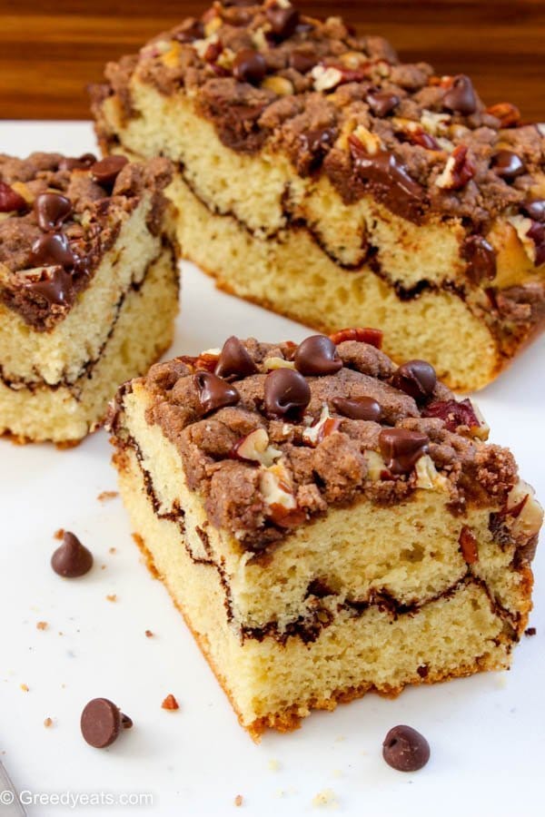 Piled high with cinnamon crumb topping, layered with chocolate in the center this cinnamon coffee cake will be a new favorite.
