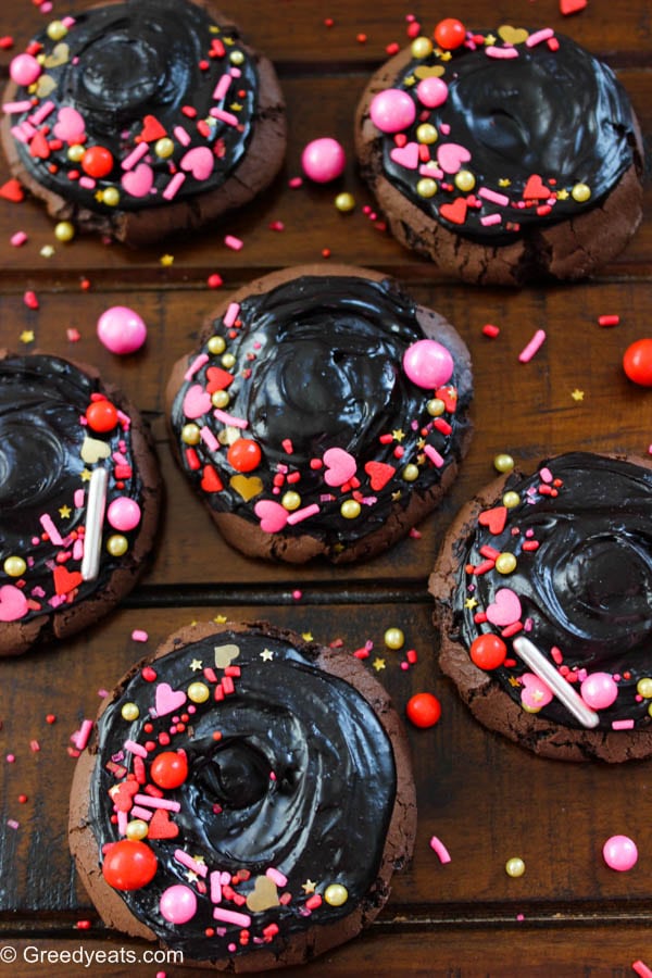 Rich and decadent Chocolate Brownie Cookies frosted with Chocolate Ganache and Valentines Sprinkles.