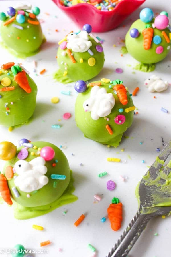 Quick, easy and fudgy chocolate easter cake pops recipe covered in candy melts and dotted with easter sprinkles