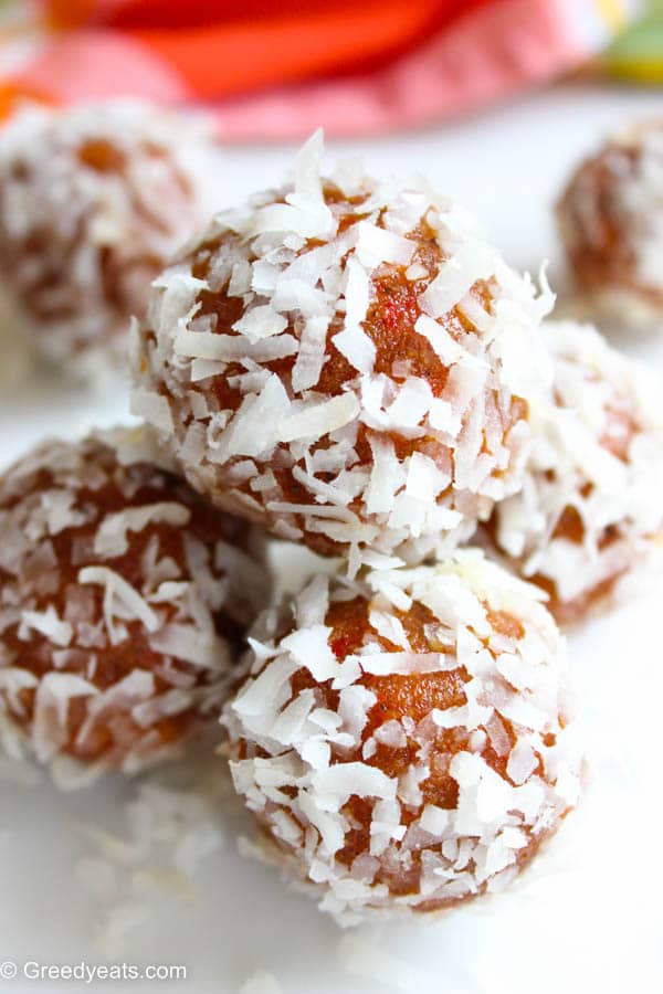 No Bake Carrot Cake Bites rolled with sweetened Coconut Flakes.