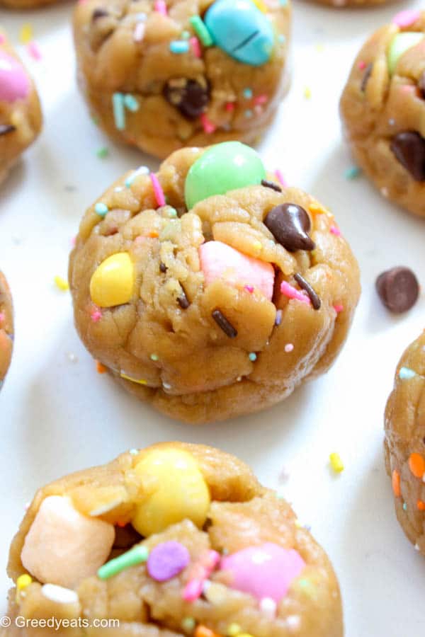 Cookie balls stuffed with chocolate chips and easter candy to bake soft chewy chocolate chup cookies