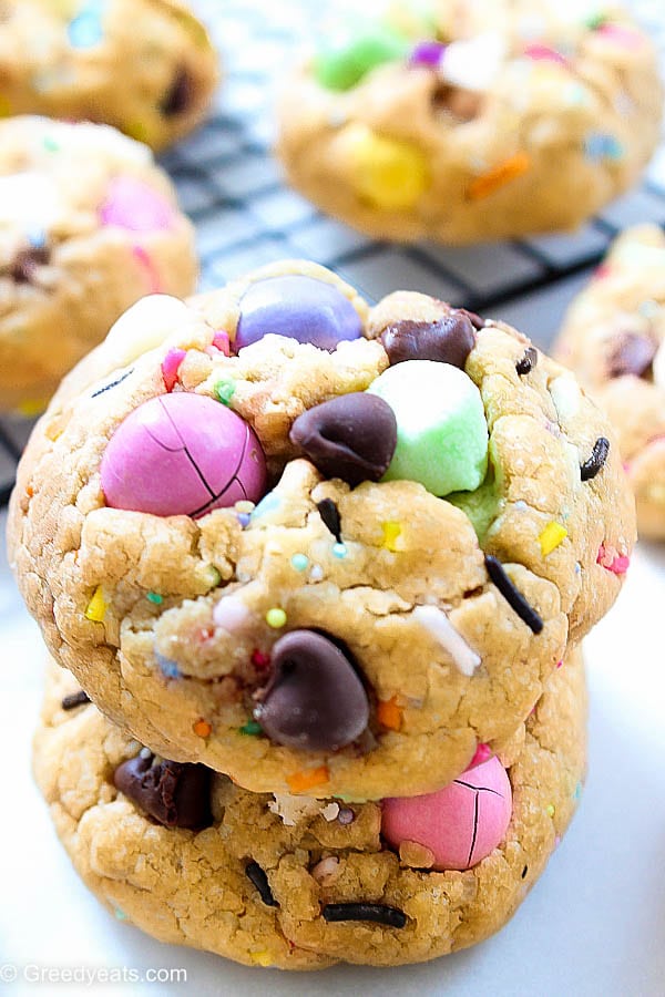 The best recipe for soft chewy chocolate chip cookies all dressed up for easter. They bake up super thick and are loaded with easter egg, chocolate chips and sprinkles