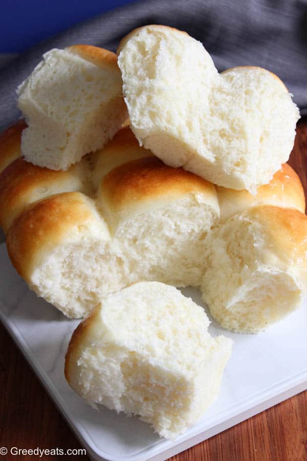 Soft, fluffy, buttery and Best homemade dinner rolls recipe made with 7 simple ingredients.