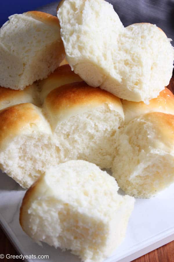 A stack of Homemade dinner rolls from scratch made with simple ingredients.