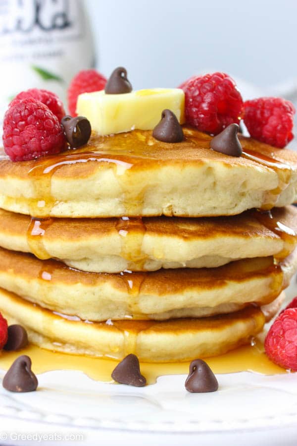 Quick and easy pancakes recipe made without buttermilk and produces super soft and fluffy pancakes.