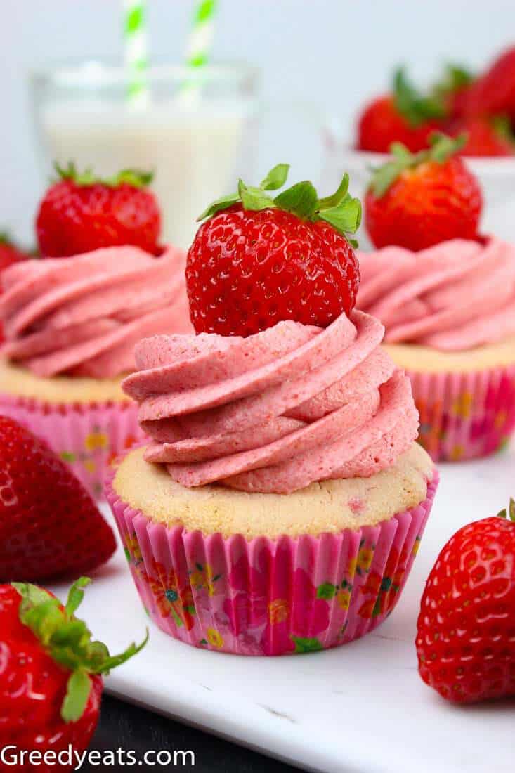 Fresh Strawberry Cupcakes recipe topped with strawberry butter cream flavored with real strawberries.