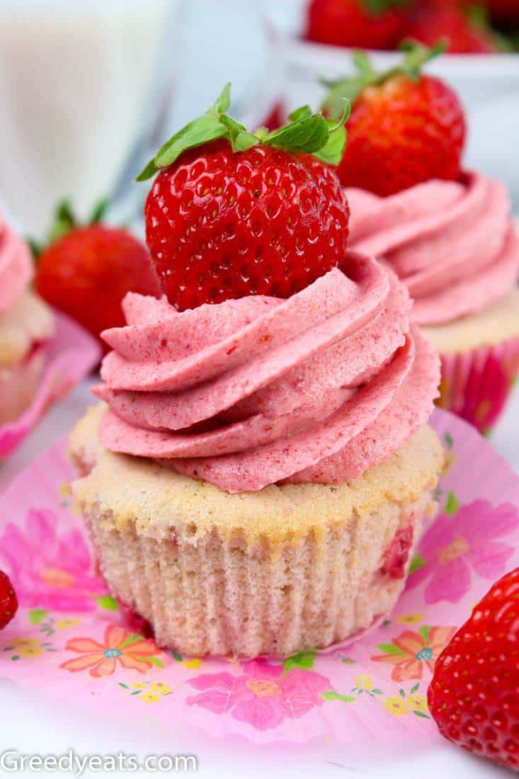 Best Strawberry Cupcake Recipe with fresh strawberry chunks and pink Strawberry Buttercream.