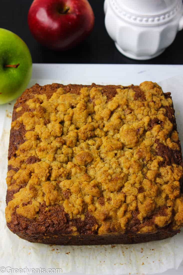 Freshly baked apple coffee cake with buttery streusel topping.