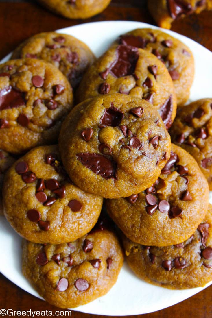 Soft Peanut Butter Cookies with mini chocolate chips on a white plate.