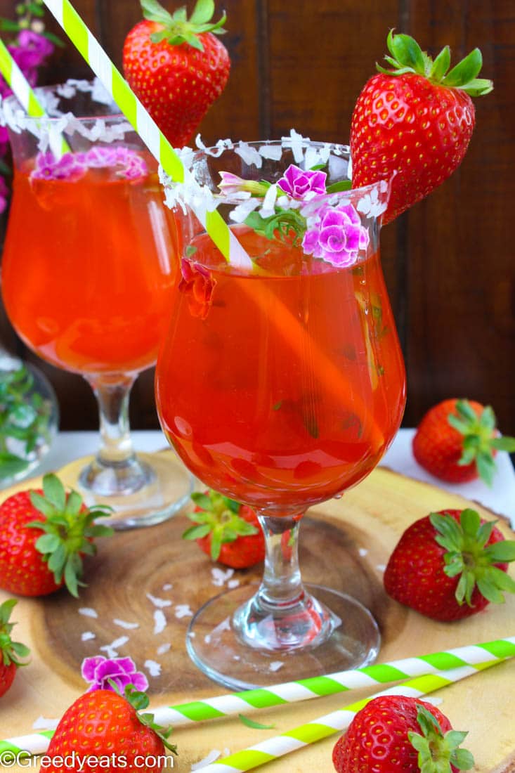 Bright and refreshing strawberry lemonade punch recipe for your next get together. Such a fun strawberry summer drink idea!