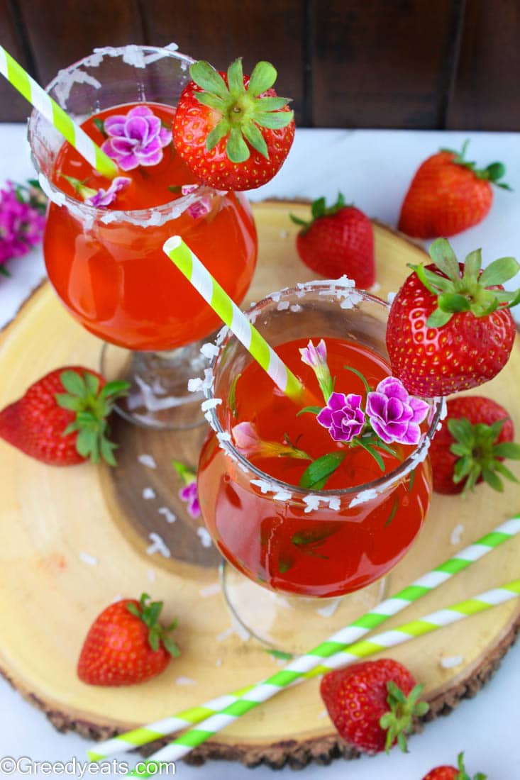 Quick and refreshing, made with 5 ingredients this strawberry lemonade punch recipe will be the talk of your summer party!