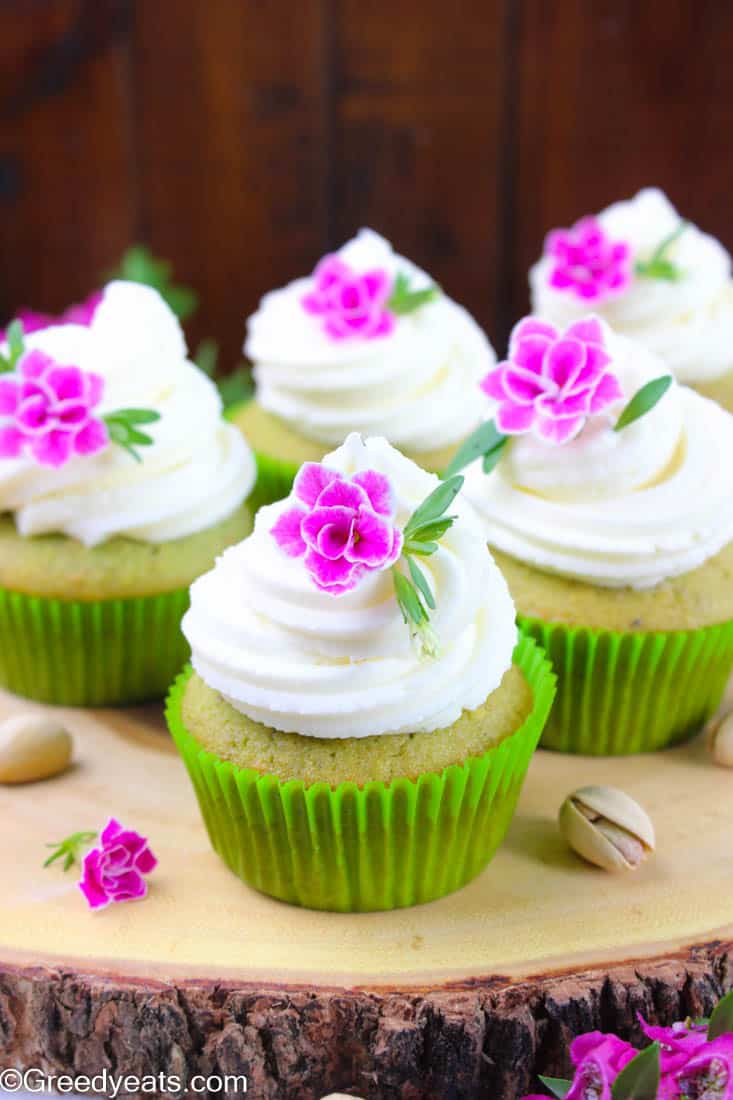 Best pistachio cupcake recipe made with real pistachios and frosted with dreamy vanilla buttercream