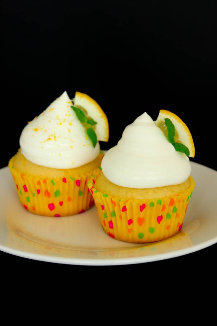 Easy Lemon Cupcakes that bake up super moist, soft and fluffy. Top these with easy Whipping Cream Frosting.