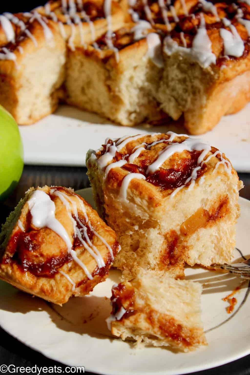 Soft and buttery apple cinnamon rolls recipe filled with warm and gooey apples!