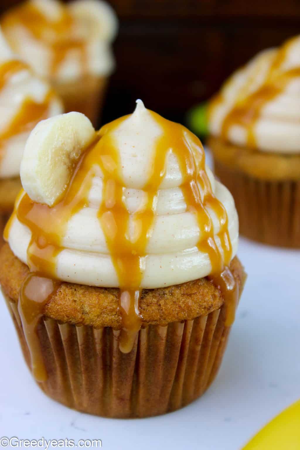 Banana Cupcakes with Cream Cheese Frosting and caramel drizzle