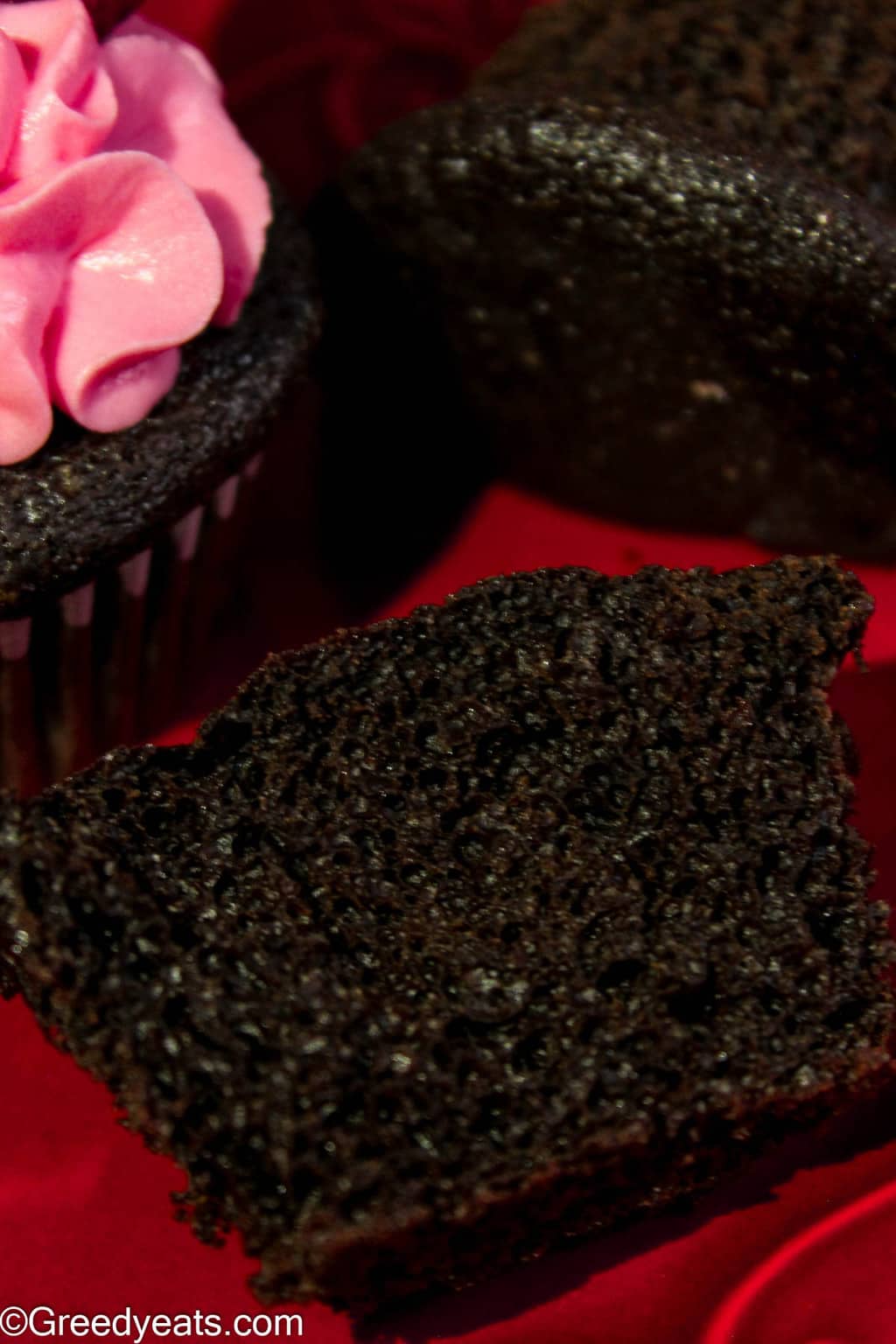 Soft, moist, decadent and easy chocolate cupcakes topped with easy strawberry frosting. 