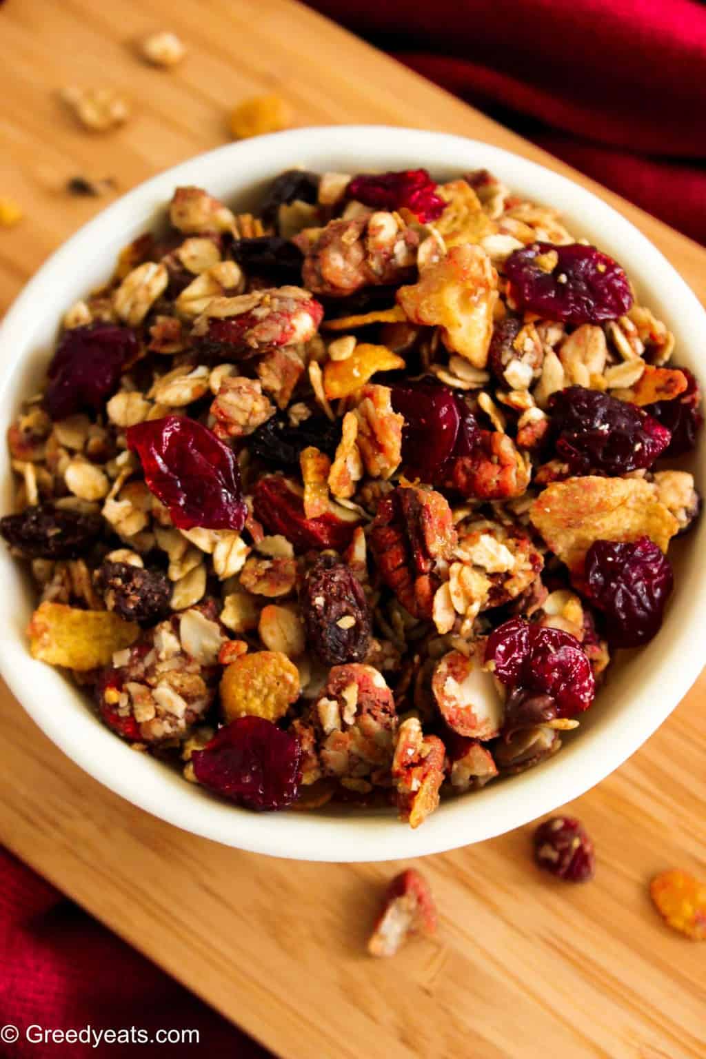 Healthy homemade trail mix baked granola recipe with nuts and berries