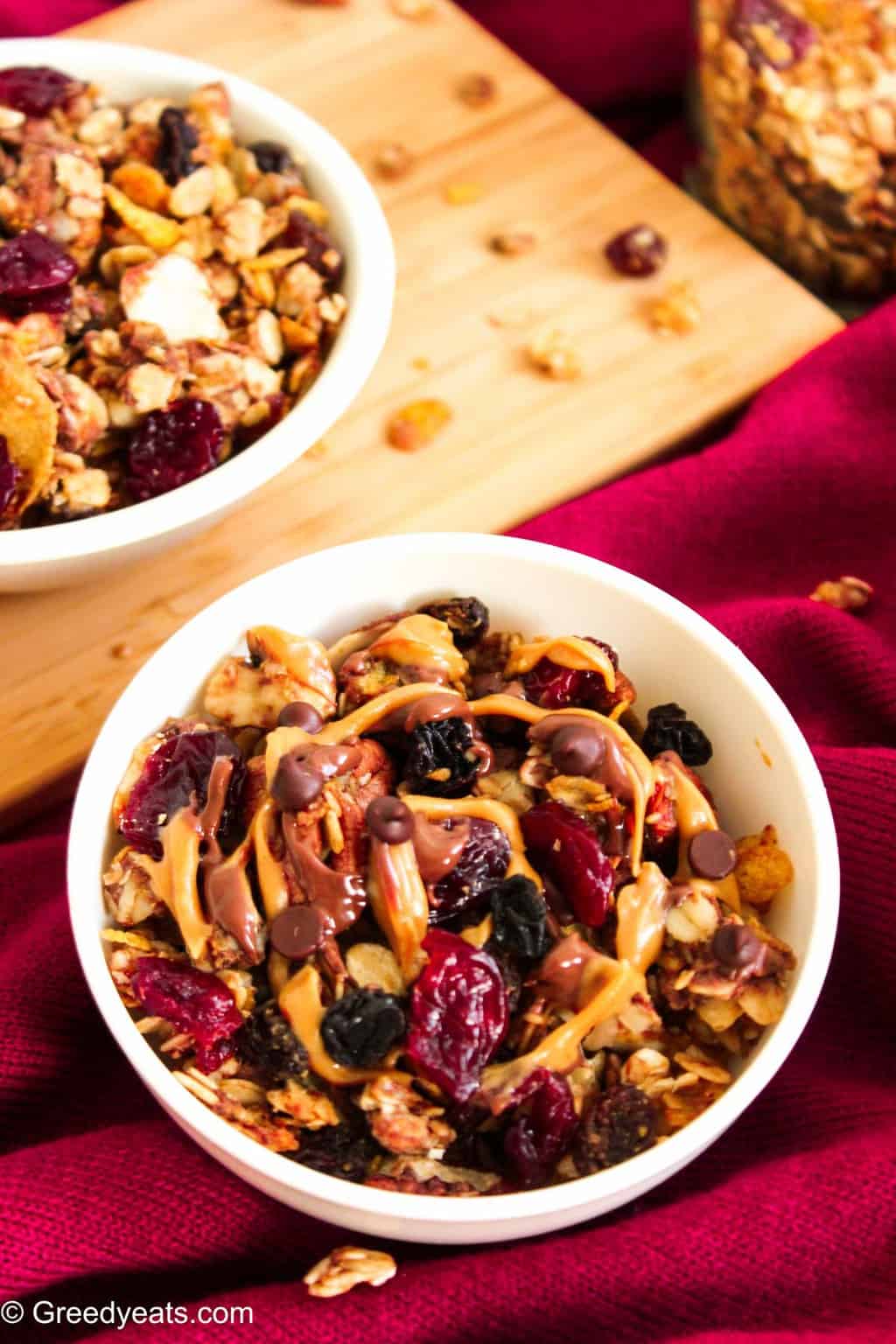 Healthy homemade trail mix baked granola recipe with nuts and berries