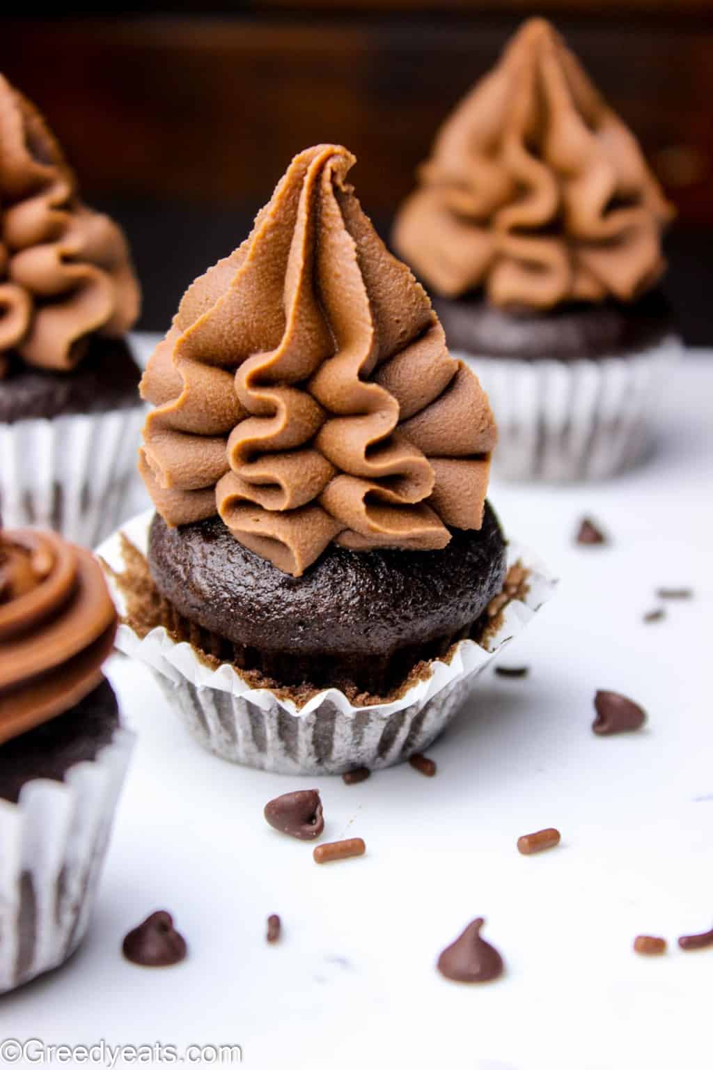 One of the best mini chocolate cupcake recipes out there! So moist, rich and decadent.