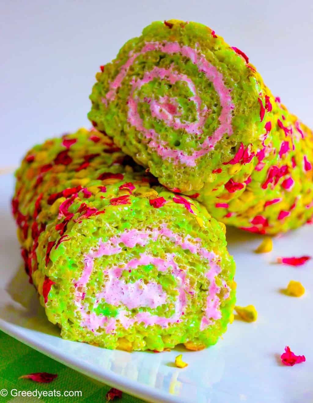 Best Rice Crispie Treats flavored with pistachios and rose, filled with pink marshmallow fluff.