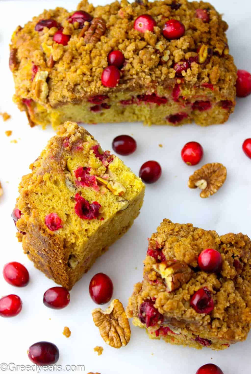 Soft, buttery and fluffy cranberry orange coffee cake slices.