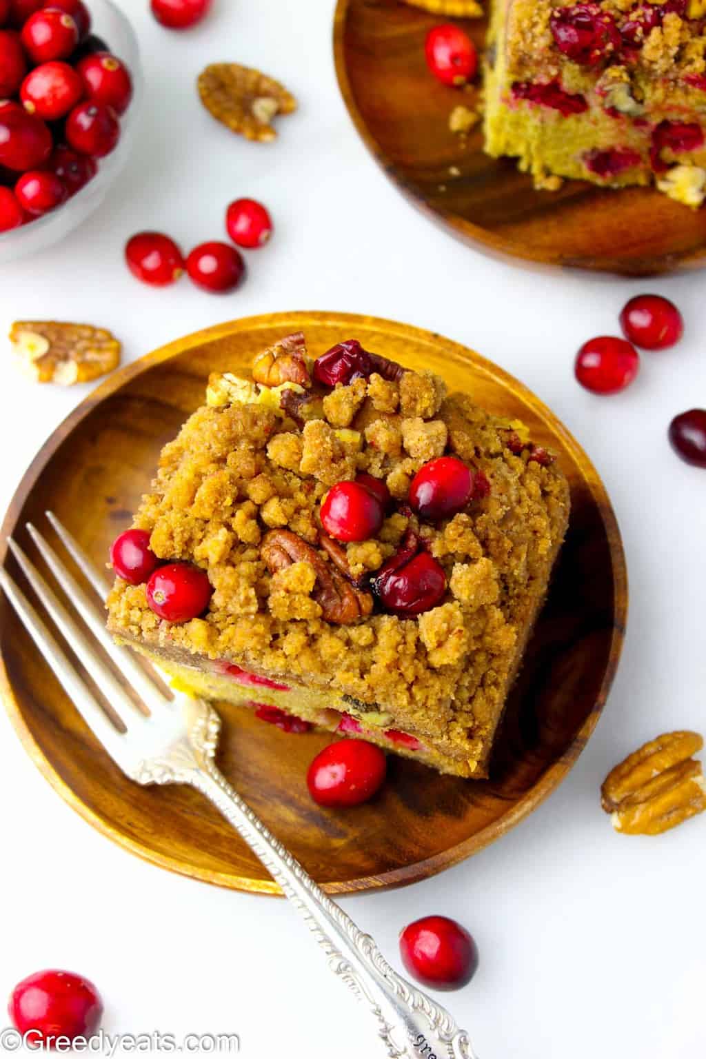 Easy Cranberry Coffee cake with buttery and slightly crunchy cinnamon crumb topping.