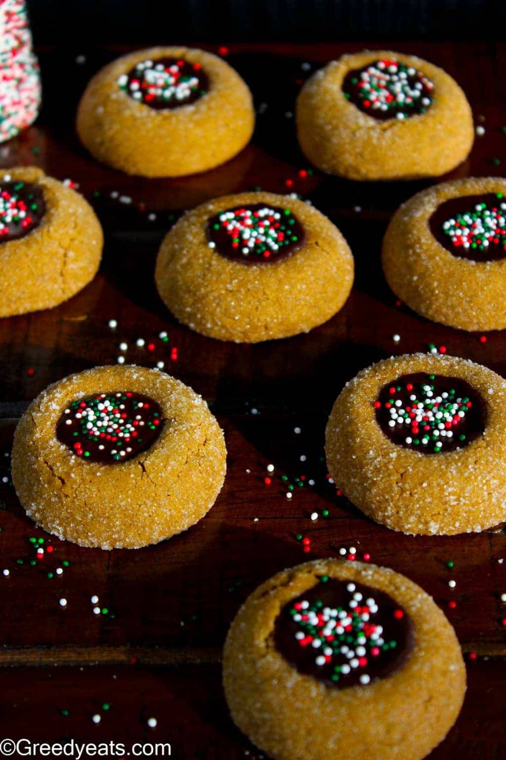 Puffy, soft and chewy molasses cookie recipe baked as Molasses Thumbprint Cookies.