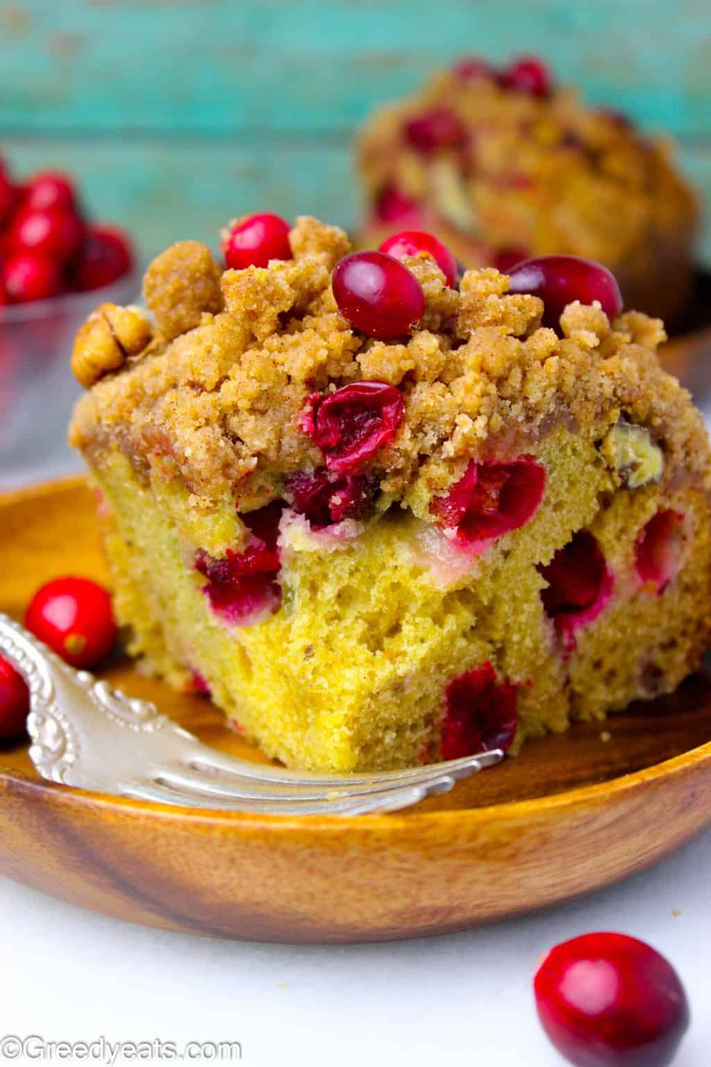 Best Cranberry Coffee Cake with thick streusel topping on a plate!