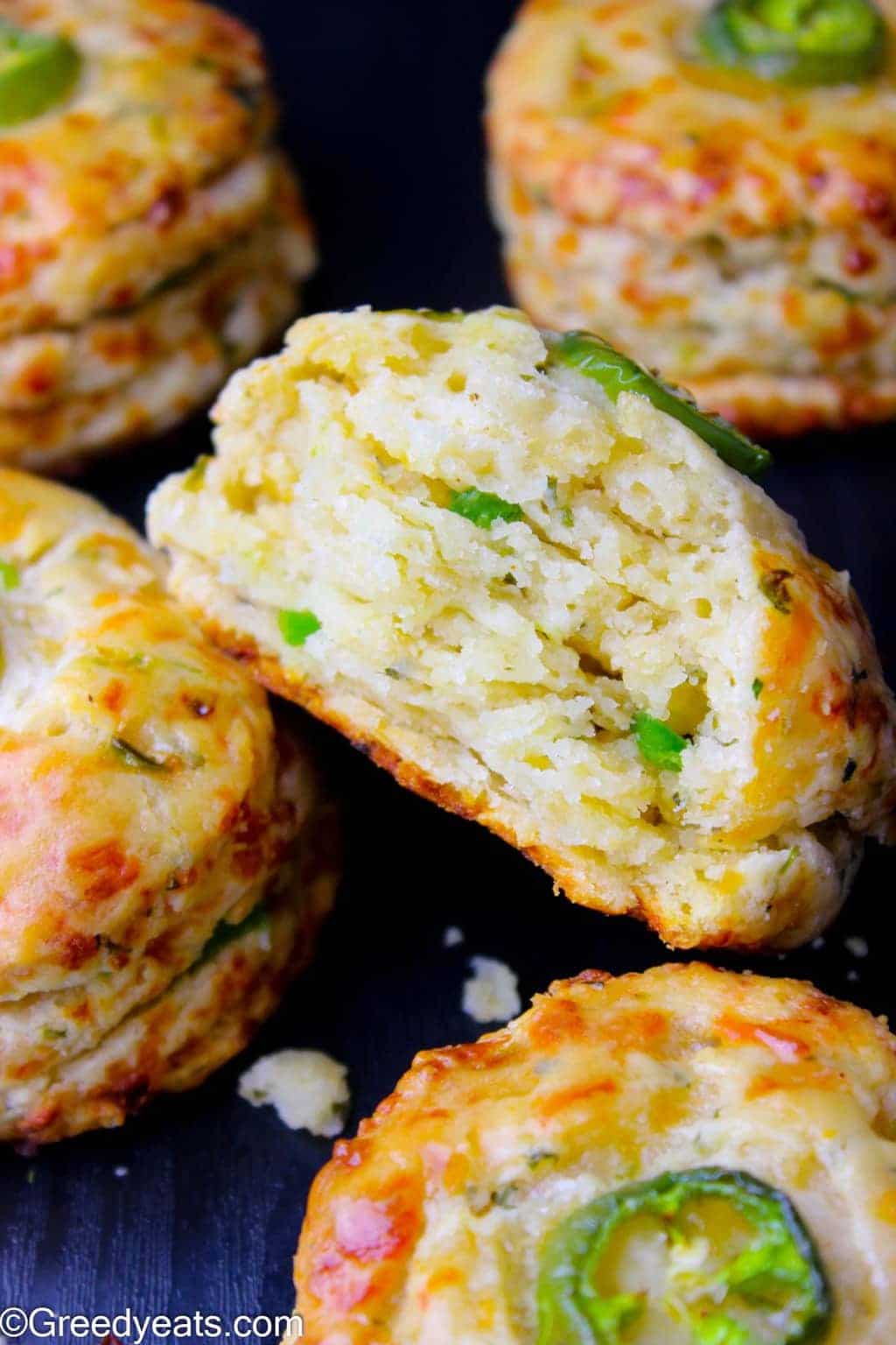 Tall and flaky Jalapeno Cheddar Biscuits recipe made with buttermilk, some garlic powder, fresh jalapeno peppers and cheddar cheese.