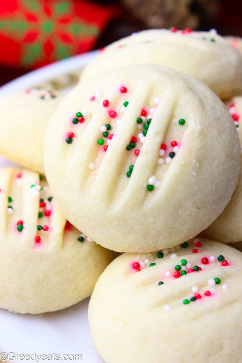 Soft and buttery, thick and puffy, my whipped shortbread cookies will be your favorite Holiday Cookies in the first bite.