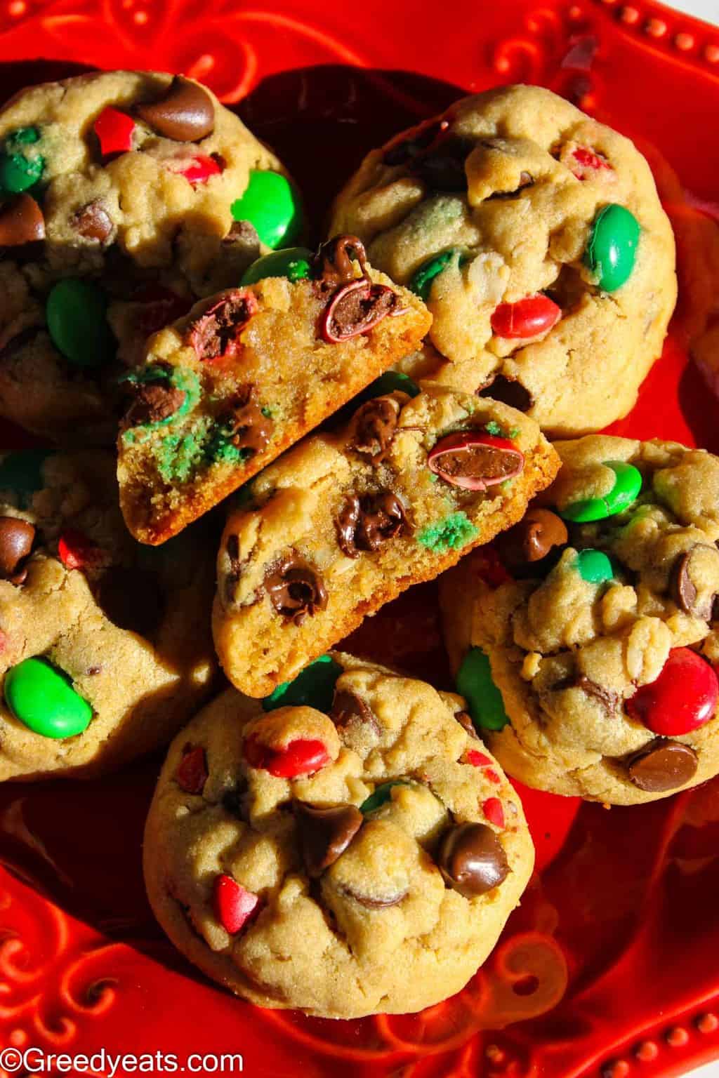 Soft and the Best Monster Cookies on a red plate revealing thick cookie texture.