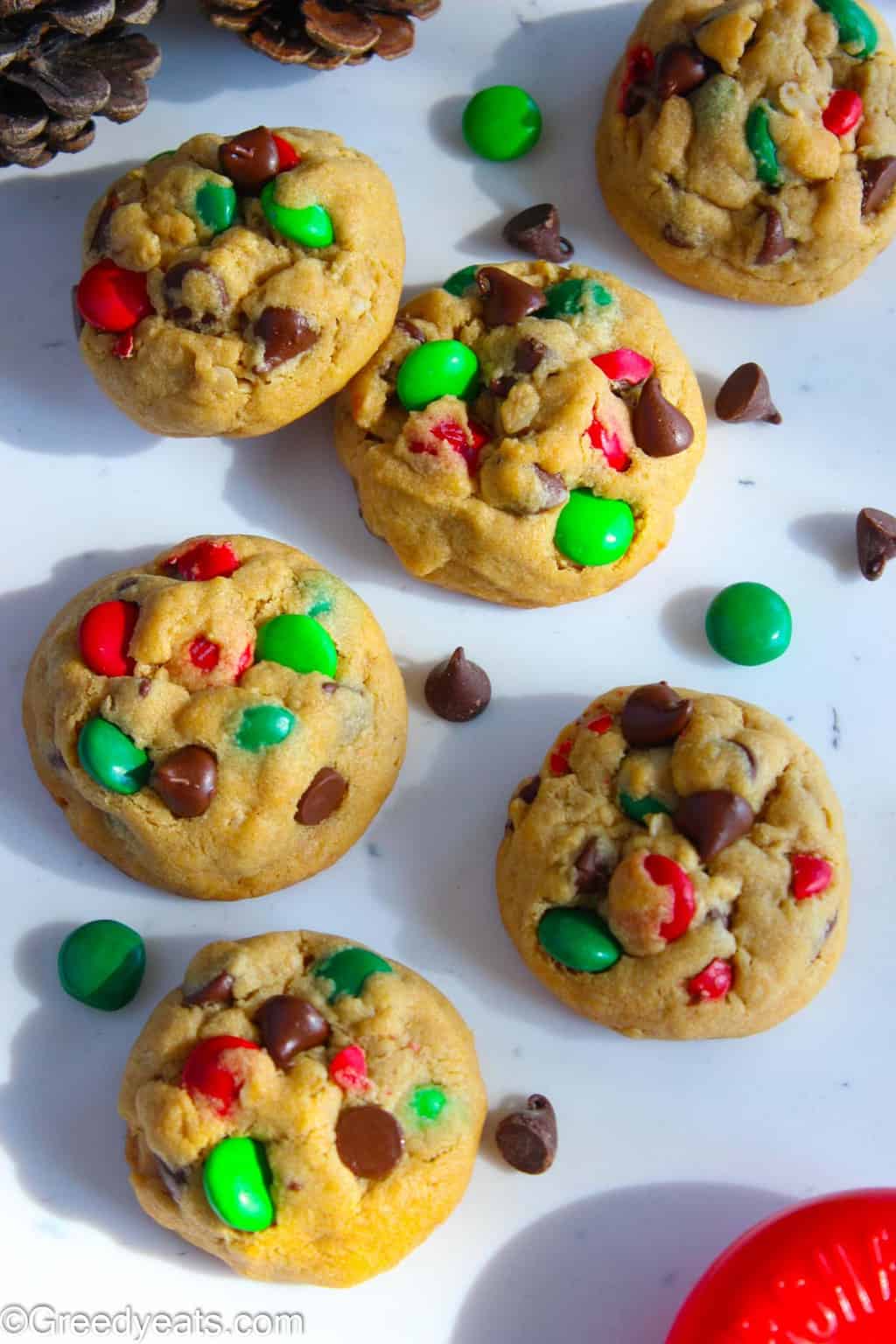 Soft, Puffy and Thick Monster Cookies all dressed up as Christmas Cookies.