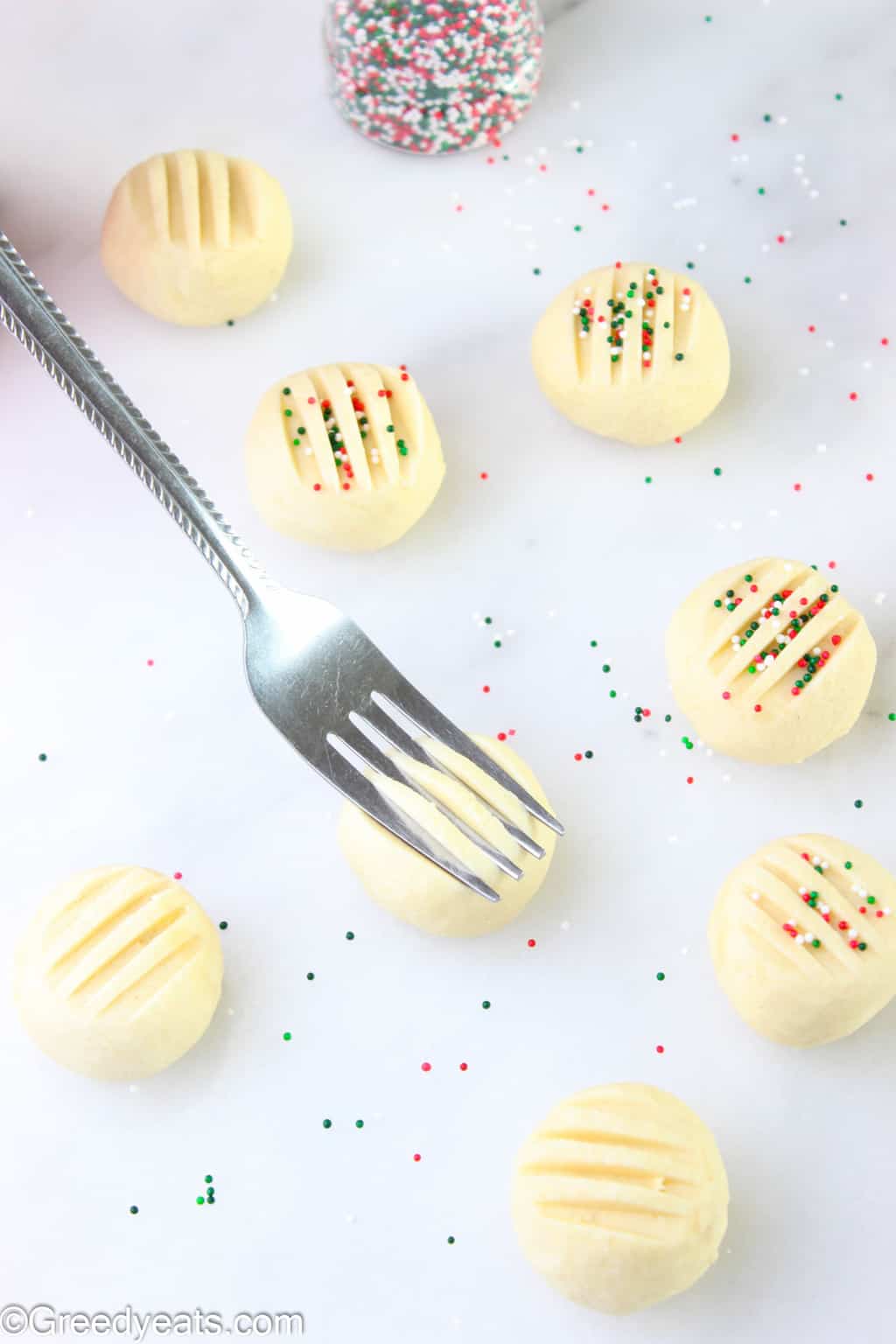 Whipped Shortbread Cookies indented with fork- An favorite Christmas Cookie recipe!